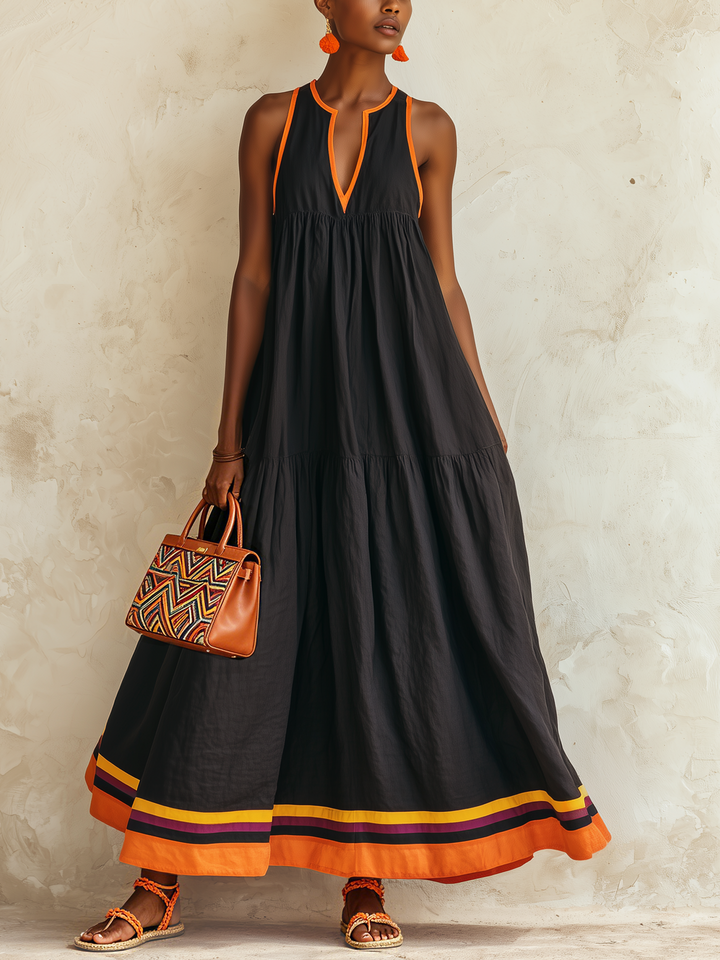 Federica | Black tiered maxi dress with orange trim and multicolor hem